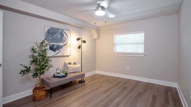 With modern wood-style flooring, natural light, and sleek ceiling fan, our bedrooms offer a perfect retreat to unwind after a long day.