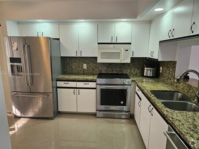 Building Photo - 1501 SW 134th Way Unit 209D Rental