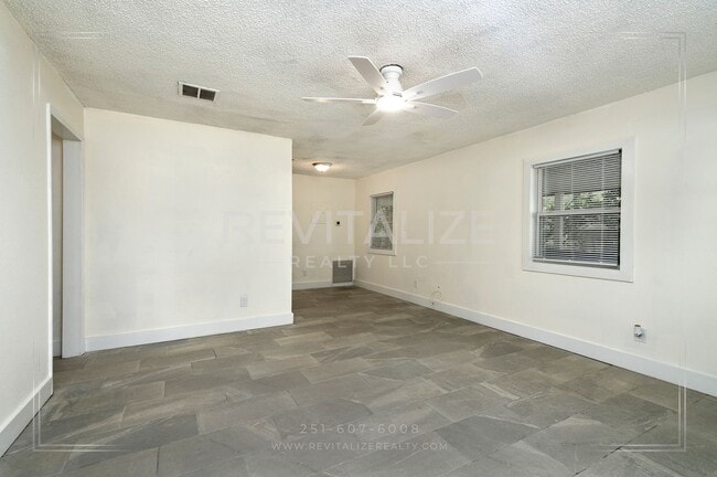 Photo - 3 BR 2 BA Home with Fenced Yard & Carport