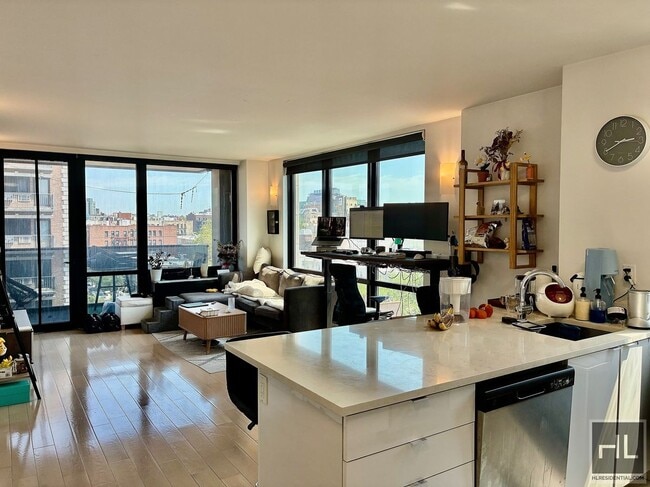 Photo - Stunning rent stabilized 1 bedroom with private balcony, onsite laundry, gym & roof deck Unit 6C