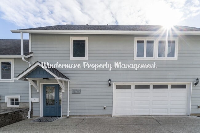 Photo - Beautifully Remodeled 2 bedroom in convenient location, private balcony, over sized garage, A/C a...