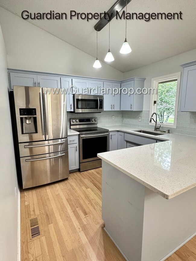 Photo - Maple Grove Split Level Home, Fenced Yard, 2 Car Garage, Dishwasher, W/D