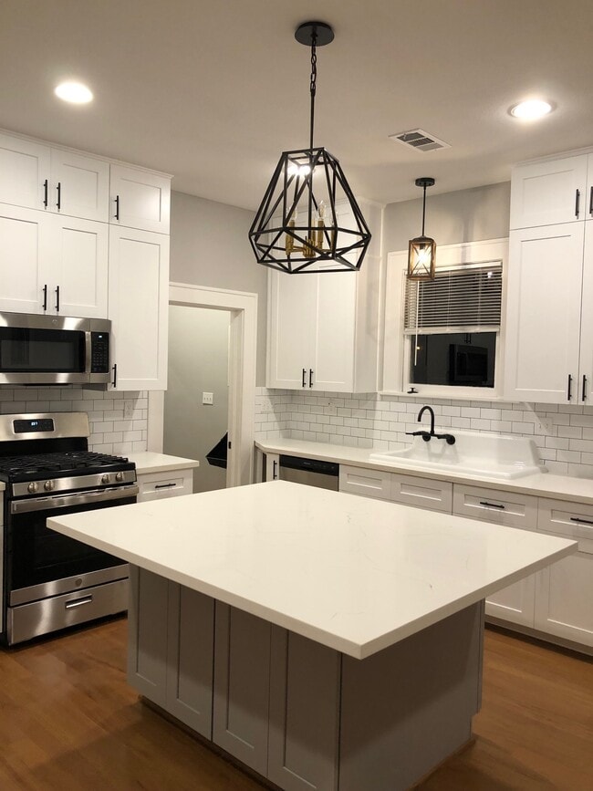 kitchen view with original newly restored sink - 1742 W Main St Unit 1742