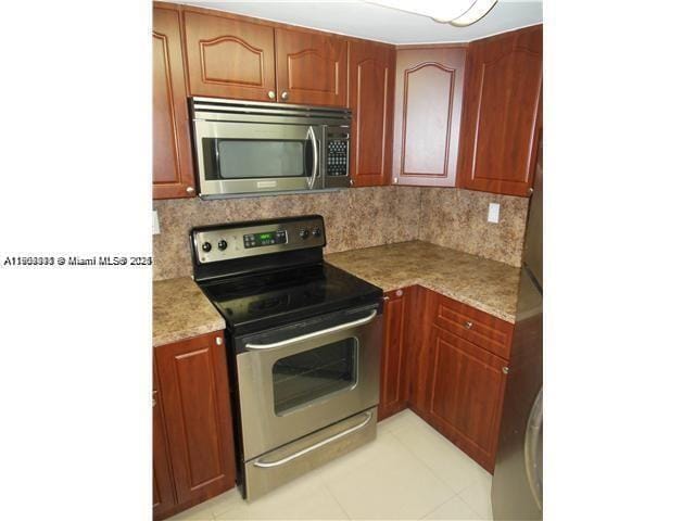 Building Photo - 8335 SW 152nd Ave Unit B-308