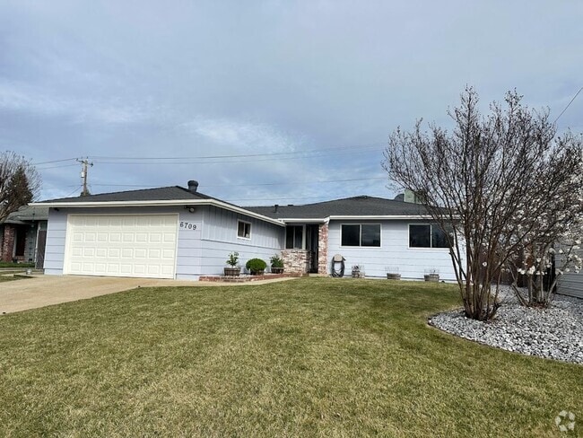 Building Photo - New exterior paint!  LVP flooring! Large y... Rental