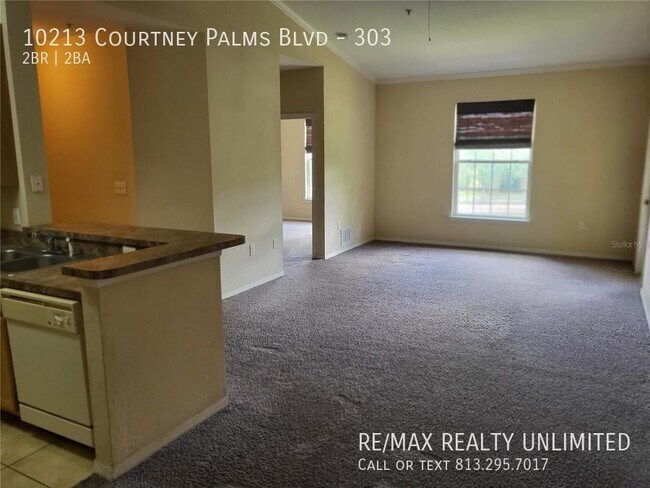 Photo - 10213 Courtney Palms Blvd Unit 303