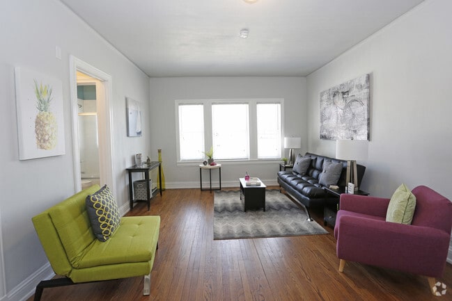 1BR, 1BA Furnished - Living Room - Marquette Place