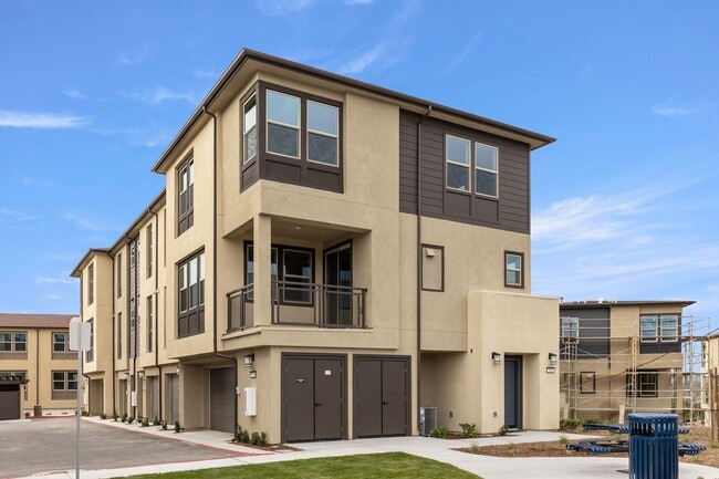 Building Photo - Brand-New 3BR Rental Condo in Oceanside | Solar, Pool & Pet-Friendly