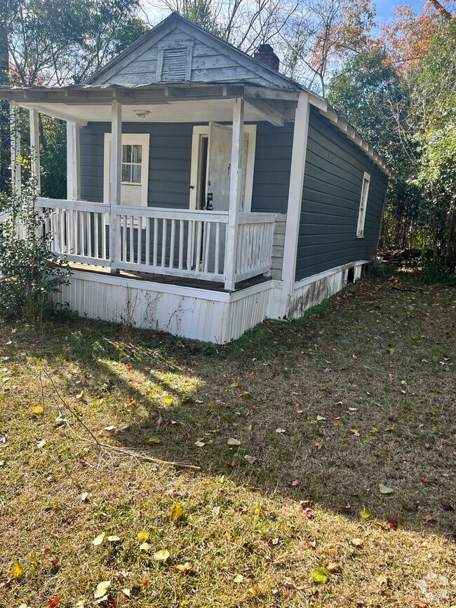 Building Photo - Single Family Shot Gun House