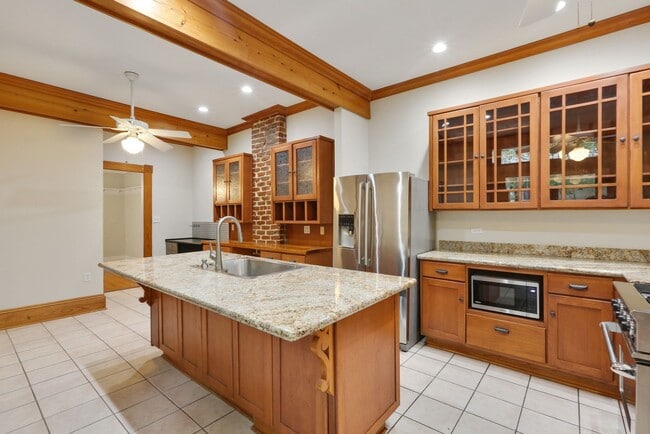 Photo - Fabulous University Duplex with gleaming floors and stained glass.
