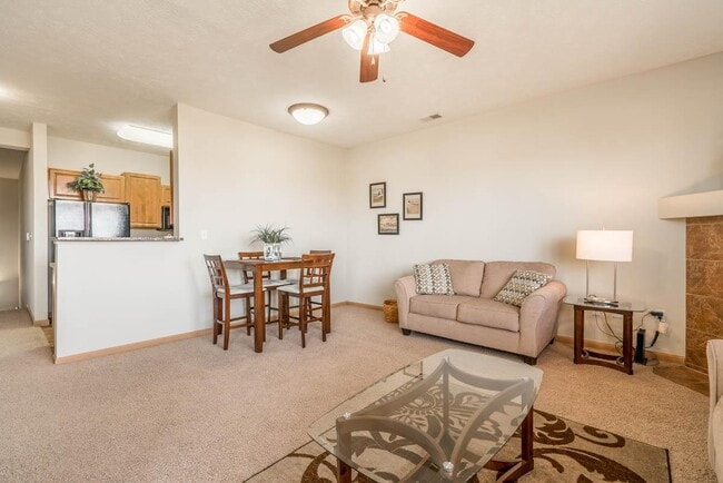 Our villas include ceiling fans and large, spacious living rooms. - Stone Ridge Estates Apartments & Duplexes