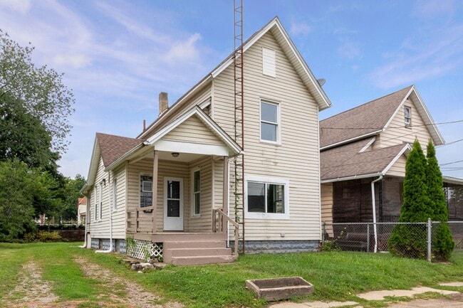 Building Photo - 2 Bed Home with Large Yard & Covered Porch – $1,295/mo