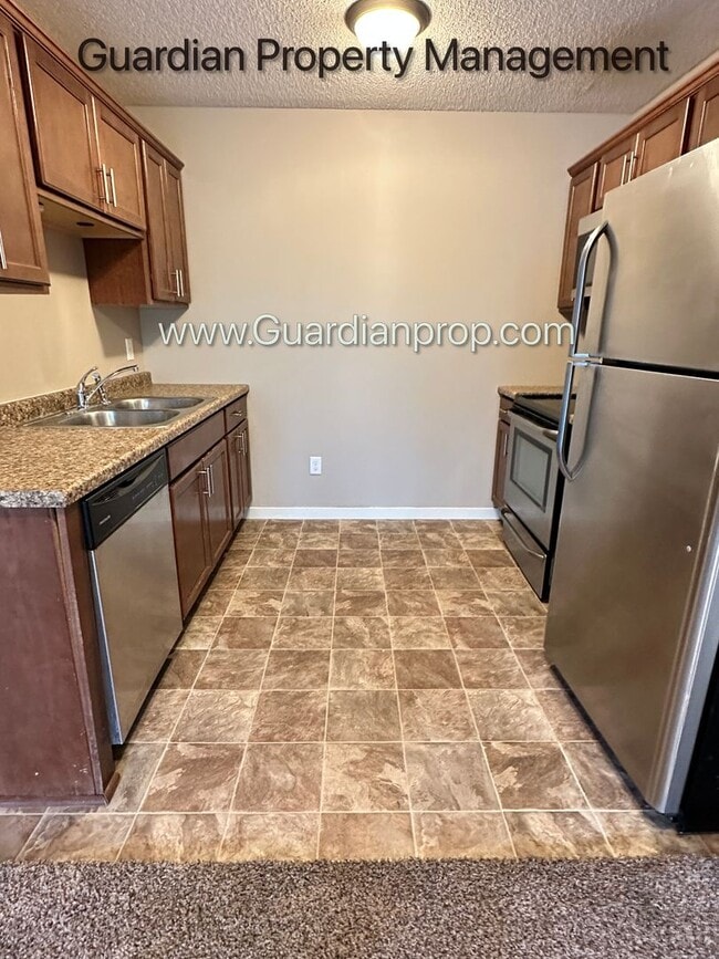 Photo - Champlin Town Home, 2 Car Garage, Dishwasher, Washer/Dryer, Balcony, July/Aug 1st Move In