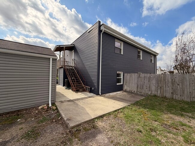 Back stairs and patio - 214 Perry St Unit Blue Moose Rentals apt B