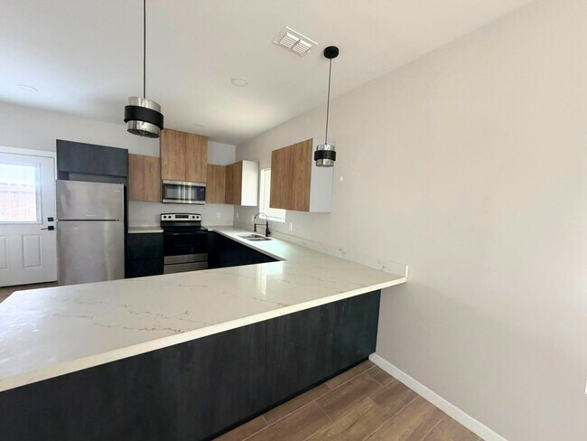 Photo - "Charming 2-Bed, 2-Bath Haven: Cozy Living in McAllen's Heart!"