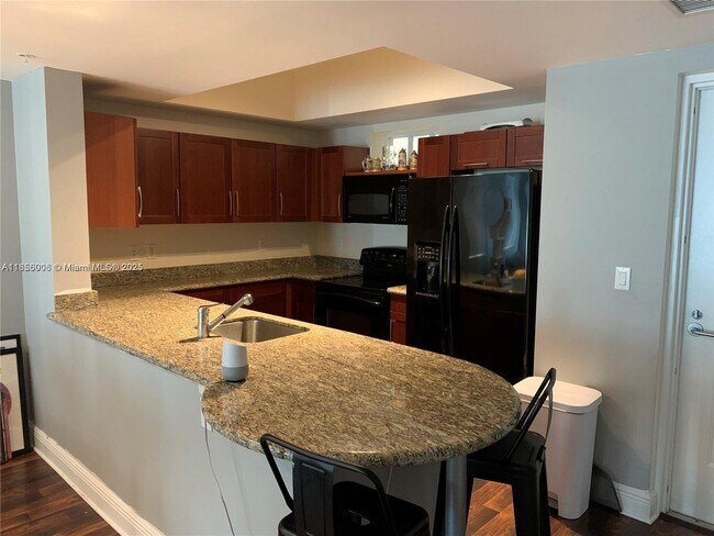 Building Photo - 7275 SW 90th St Unit C312 Rental