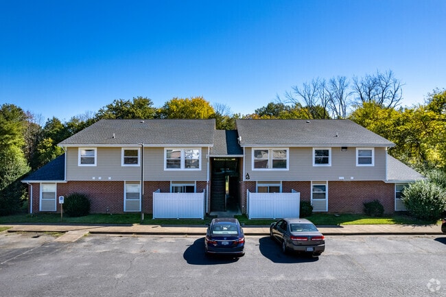 Walk-Up Parking - Heritage Acres Apartments