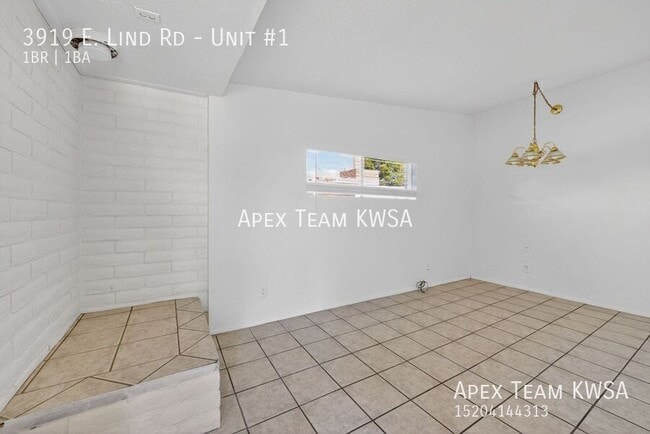 Building Photo - 3919 E Lind Rd Unit #1