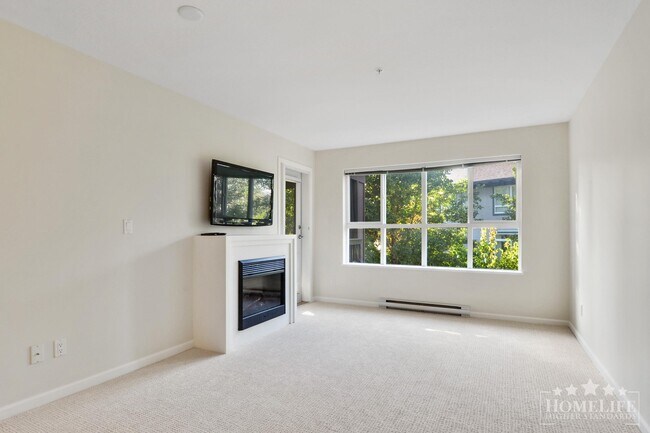 Photo - Introducing a charming 2 bed, 2 bath condo with a spacious patio fit for entertaining - Located ... Unit 209