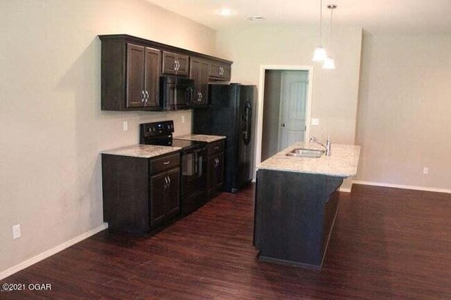 Photo - 5061a Raintree Cir Unit B