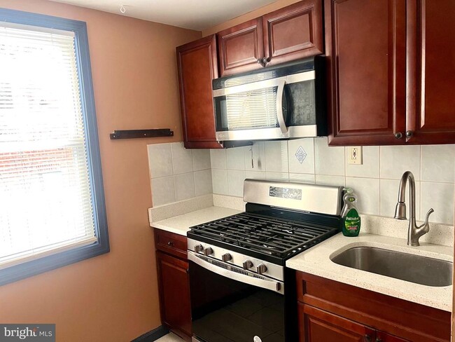Building Photo - 4604 Baltimore Ave Unit 1 REAR