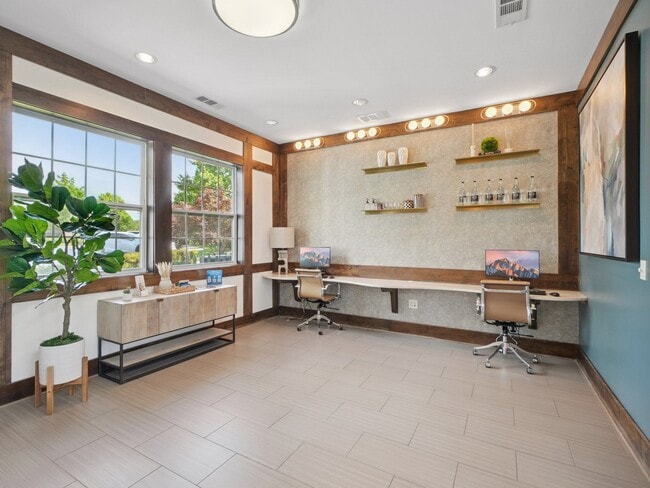 Modern resident business center and coworking space at Village at Broadstone Station in Apex, North Carolina