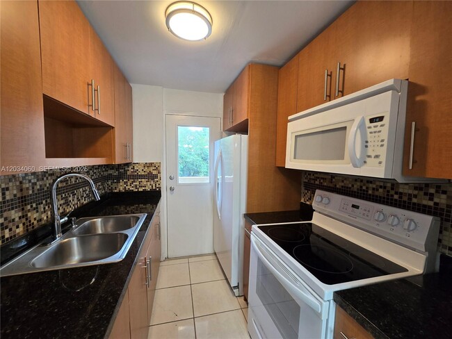 Photo - 1475 NE 125th Terrace Unit 304-B
