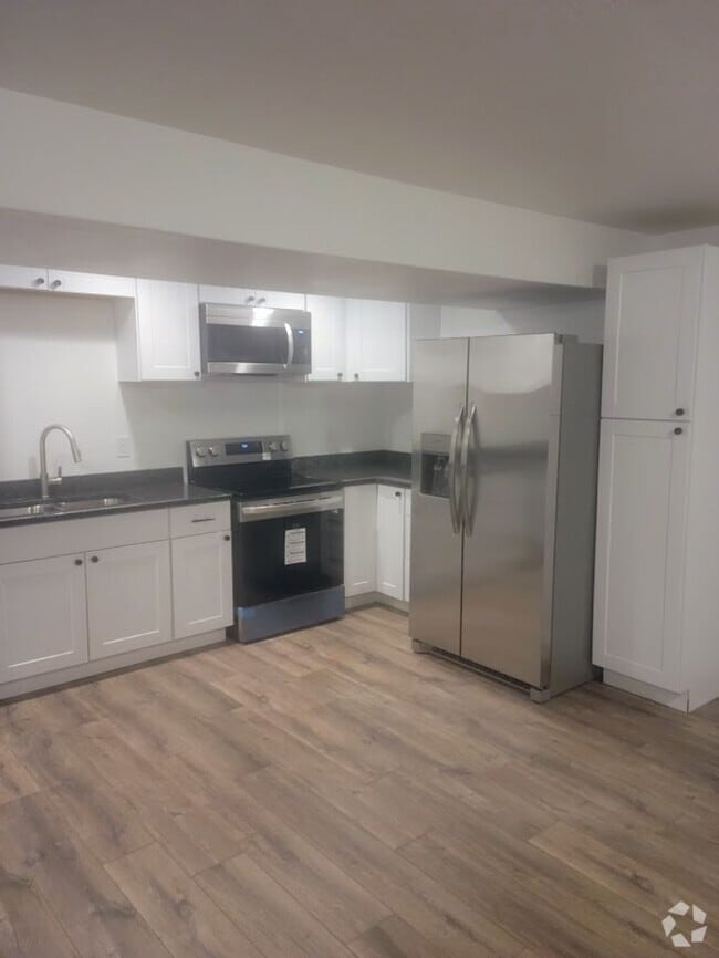 Building Photo - Spacious 3-Bedroom Basement Apartment – Al...