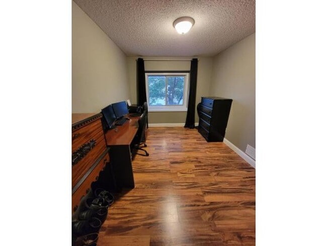 Photo - 3BR Townhome | Ensuite Primary + Walk-In Closet | Upper Laundry-Avail. June 1st