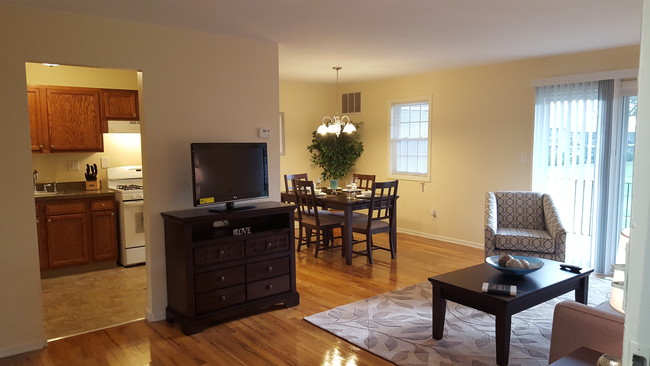 1 Bedroom Open Floorplan Living Room/Dining Room - Milford Beach Apartments