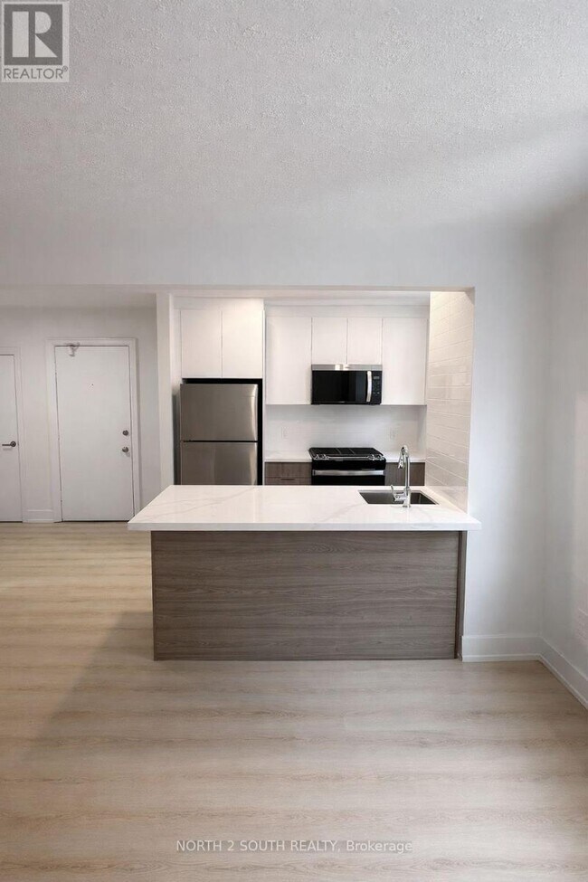 Photo - 1024 King St E Unité 9