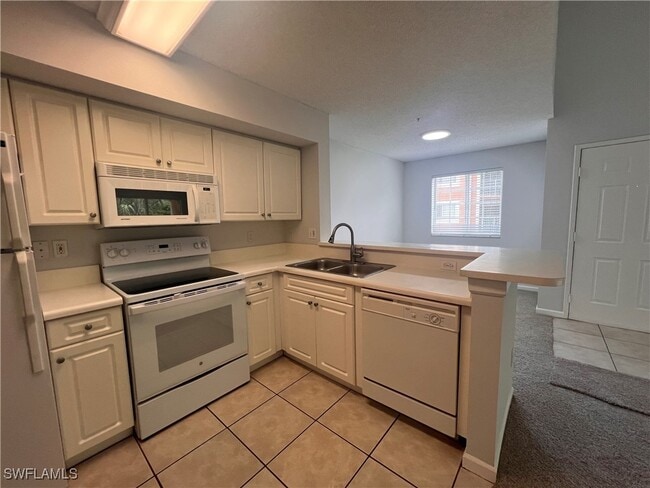 Building Photo - 1280 Wildwood Lakes Blvd Unit 202 Rental