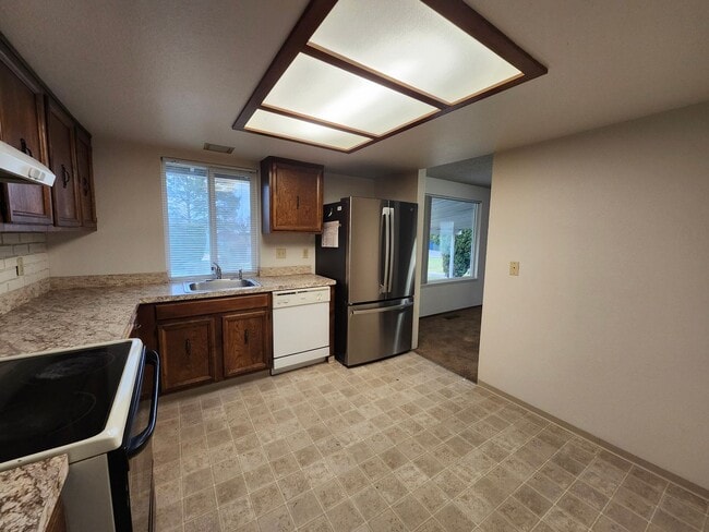 Photo - Spacious One Level 4 Bedroom, All New Kitchen Appliances, Landscaping Included!