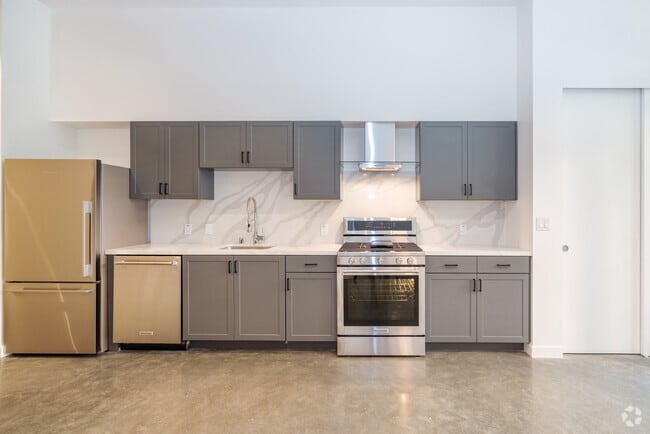 Gourmet Kitchen with Stainless Appliances & Wood Cabinetry