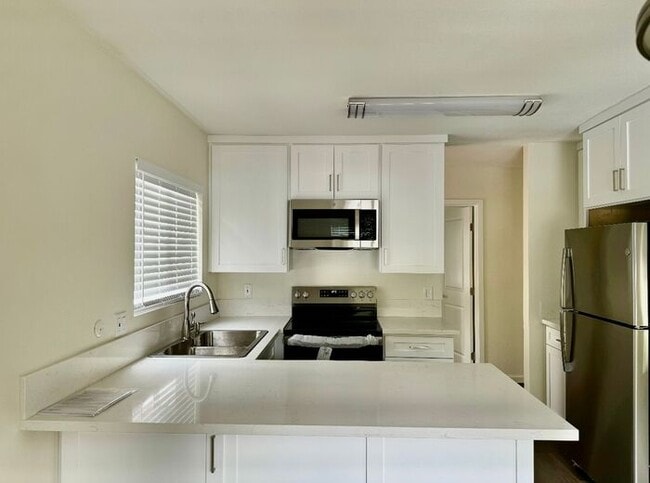 Photo - Beautifully remodeled 2 bedroom, 1.5 bathroom condo! Unit 16