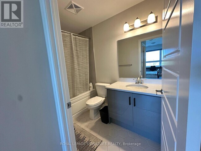 Photo - 3265 Carding Mill Trail Unité 206