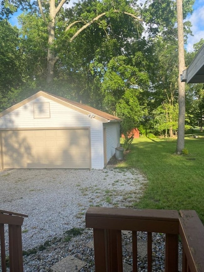 Photo - Ranch home with two car garage located on over 1/2 acre