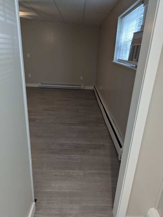 Photo - 100 E Washington St Apartamentos