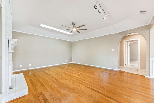Photo - "Charming garden home offers 3-Bedroom Sanctuary with Cozy Fireplace in San Antonio – 1710 Sq Ft ...
