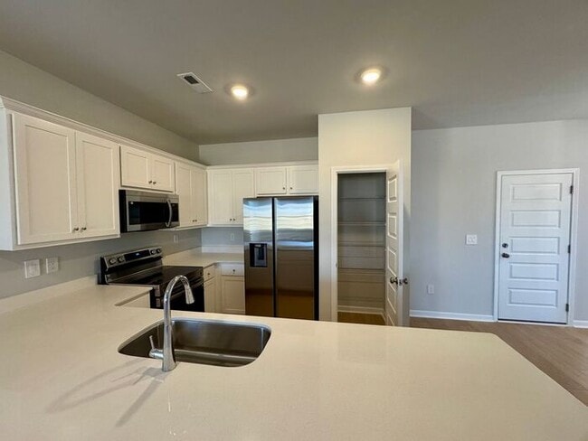 Photo - MOVE IN SPECIAL-NEW CONSTRUCTION-FENCED YARD