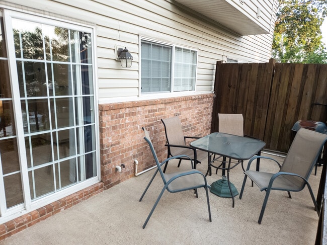 Back patio overlooking pool and at lake Hamilton - 118 Pretti Pt Unit B3