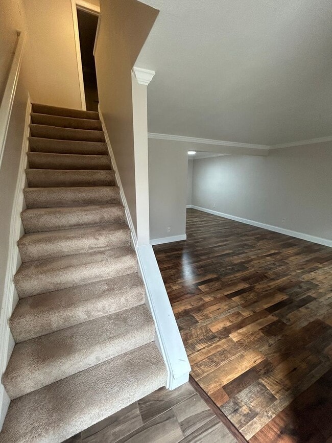 Photo - Modern Charm: 2 BR Home with Finished Basement, Pet Friendly, Assigned Parking, and Prime Location!