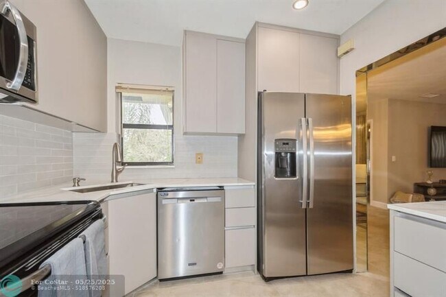Photo - 4485 Carambola Cir N Unit 27322