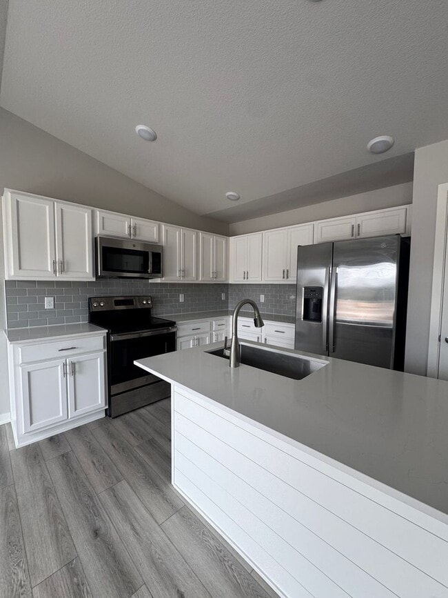 Photo - Luxury Home with Attached 2 Car Garage and finished basement!