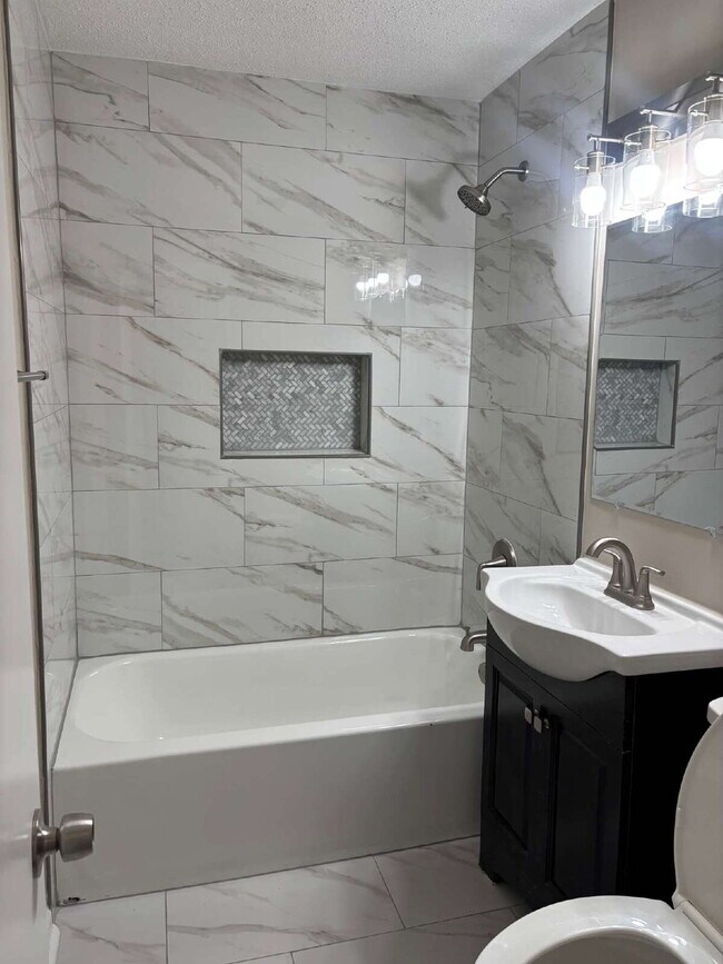 "Charming 3-Bedroom Retreat on Suncrest Drive with Gleaming Hardwood Floors!"
