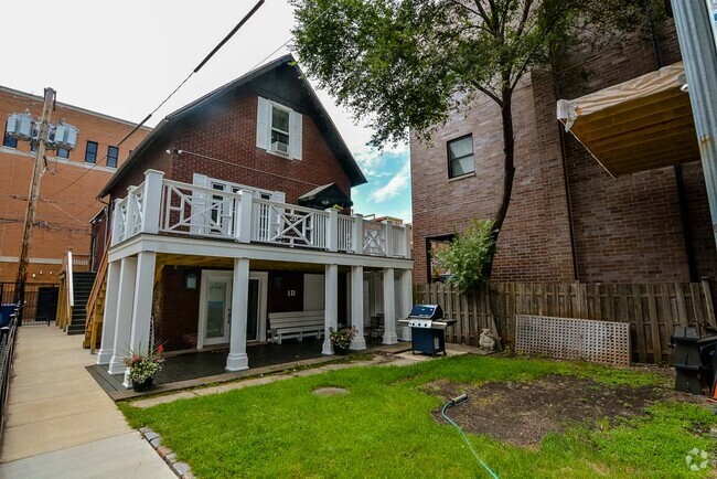 Building Photo - 1415 W Byron St Unit G04C Rental