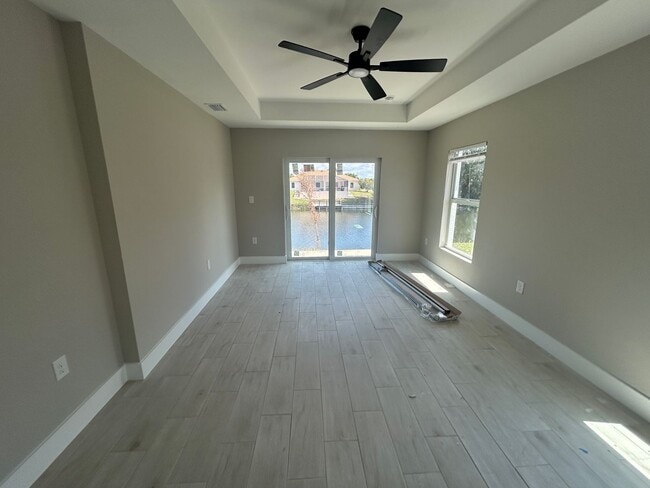 Photo - Coming soon 4/3 new construction overlooking canal