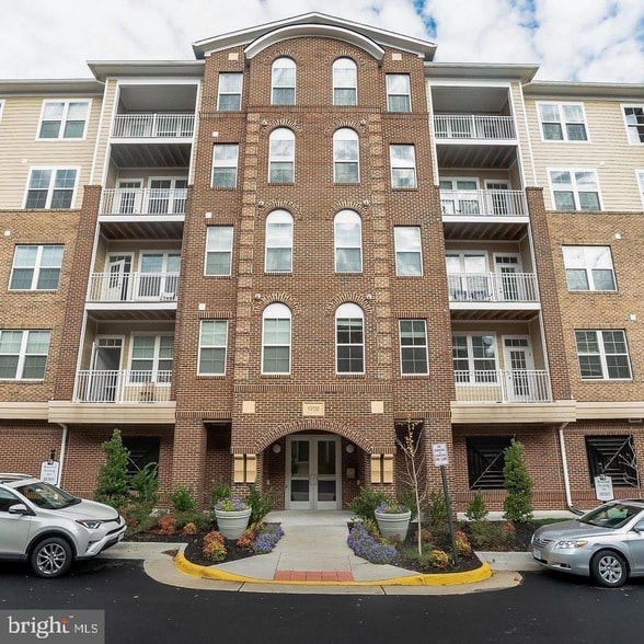 Building Photo - 13722 Neil Armstrong Ave Unit 308