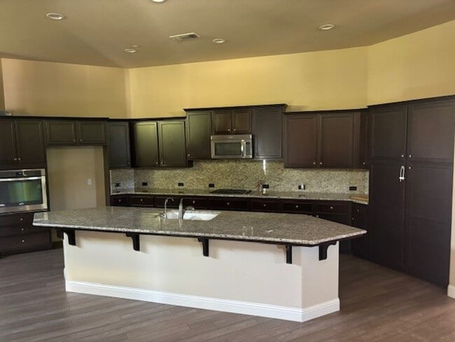 Photo - Elegant 4-Bedroom Home with Paid Solar in ...