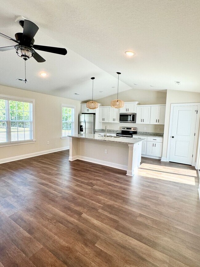 Photo - BEAUTIFUL pond front home! All the details make this a showstopper.! Fenced Yard!!